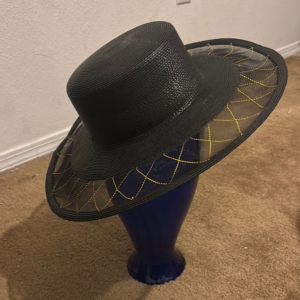 Elegant Black Hat with Gold Accents